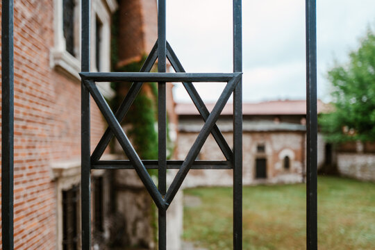 Star of David on he fence of a synagogue in Krakow