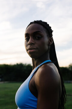 Portrait of an athletic woman posing firmly with an empowered look