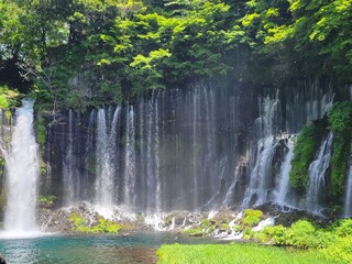 A beautiful Japanese waterfall is flowing