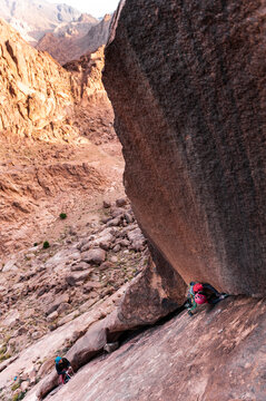 Rock climber with willpower and brave spirit