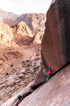 Rock climber with willpower and brave spirit