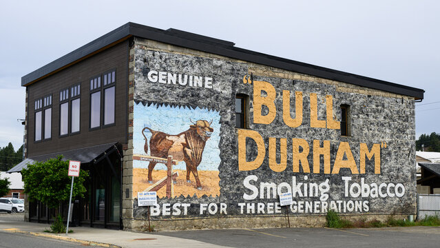 Cle Elum, WA, USA  - June 9, 2024; Historic Bull Durham advertising mural on side of Railroad Avenue building