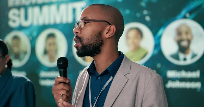Man, microphone and talking for business summit as presenter, guest or event host in panel discussion. Male person, public speaker and speech in conference, seminar or convention for renewable energy
