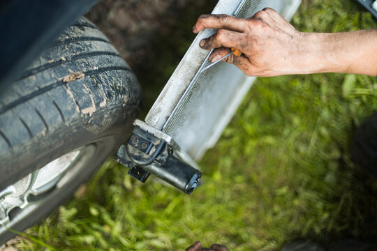Outdoor Garage Work Repairing Car Parts 