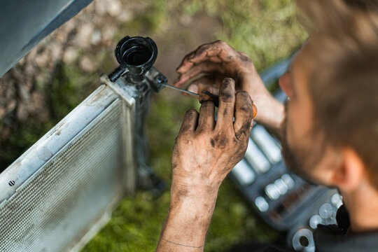 Worker Repairing Car Parts Dirty Hands