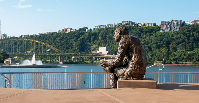 The Thinking Man Statue of Mister Fred Rogers admiring the water fountain of Point State Park