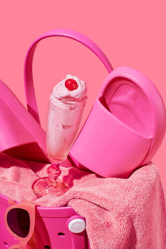pink summer items in a pink bag