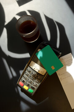 Terminal with credit card on the table