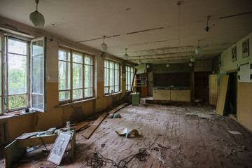 Ruined classroom in abandoned school