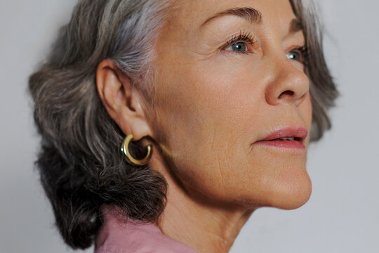 Serene mature woman studio portrait