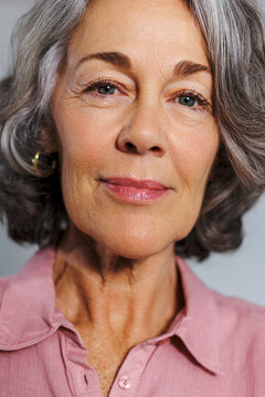 Serene mature woman with a warm smile