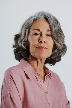 Serene mature woman in studio