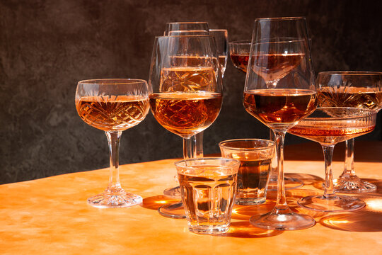 Many glasses of ros&eacute; wine.