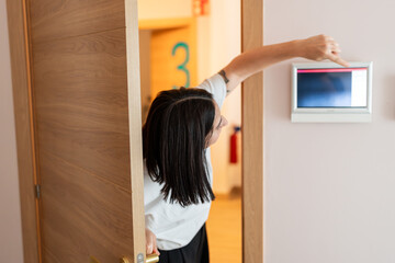 Woman checking smart screen.