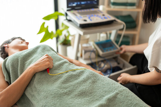 Physiotherapist with patient.