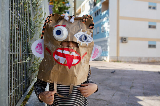 boy in diy monster mask  