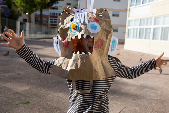 boy in diy monster mask  