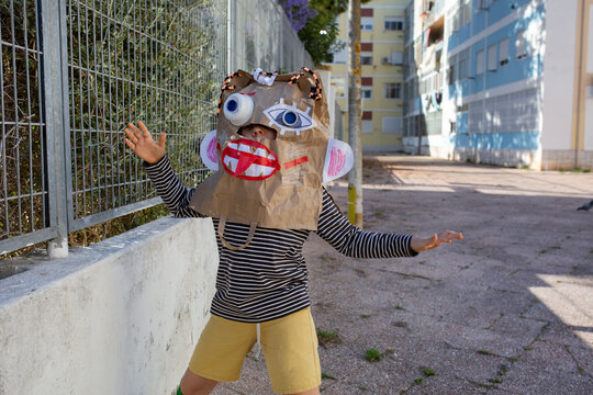boy in diy monster mask  