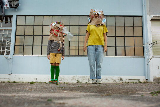 woman and boy in diy monster mask  