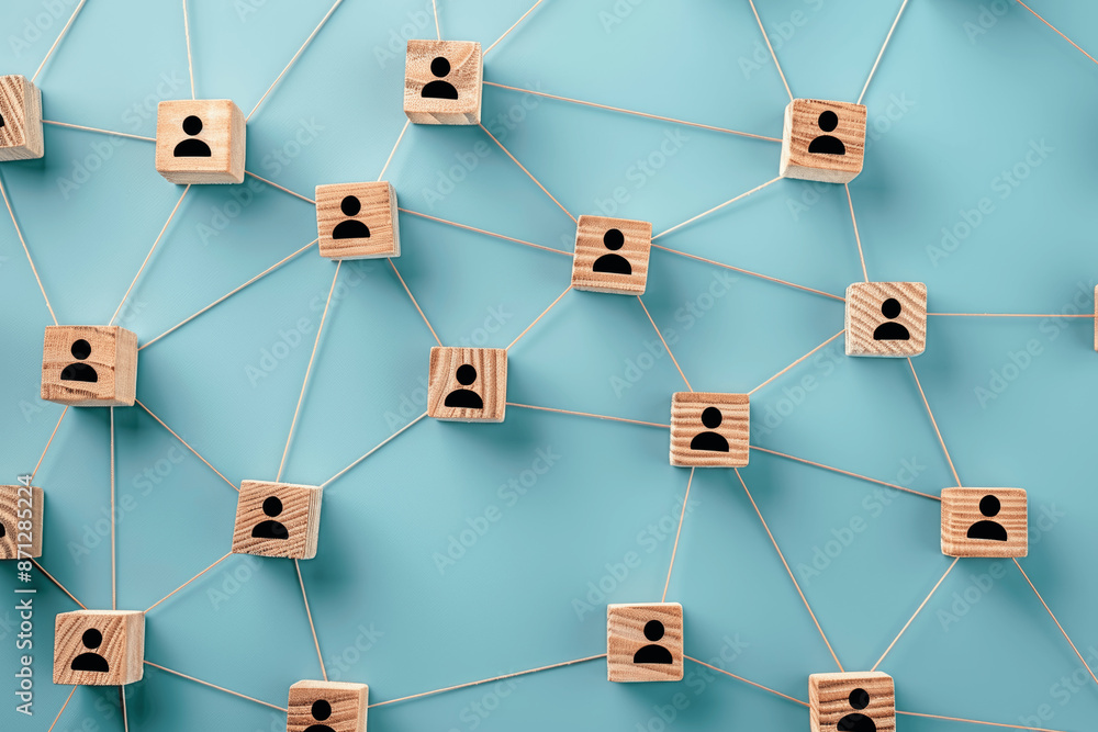 Poster top view business network with handshaking icons on wooden blocks connected on blue background for a