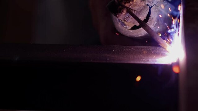 Industrial Metal Welding Sparks and Flashes Flying