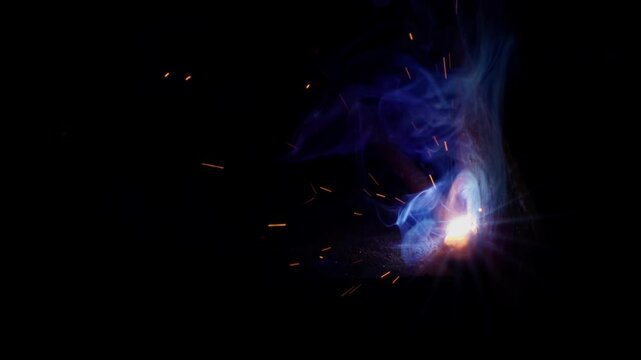 Industrial Metal Welding Sparks and Flashes Flying