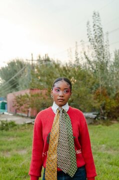 Young African woman posing with balloon