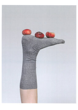 Saturn peach holding foot
