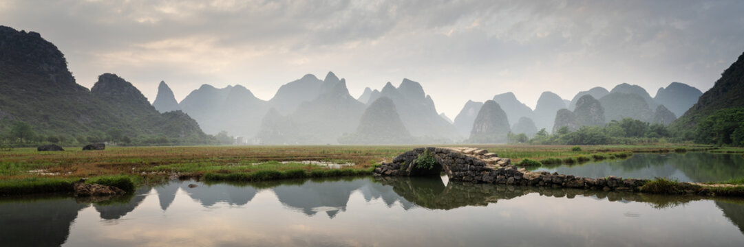 Zhuangyuan bridge Guilin mountains China sunrise