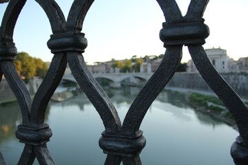 Obraz premium fences on bridge over the river