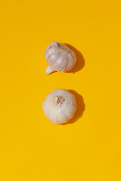 Garlic on a yellow background 