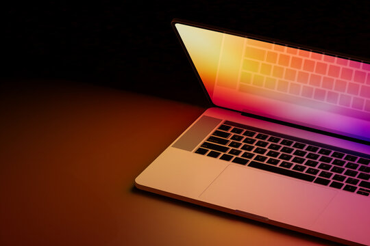 Illuminated laptop screen in dark room, concept of technology