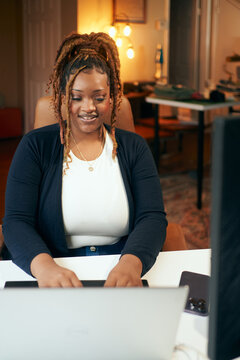 happy woman working from home