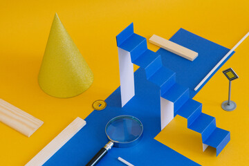 A minimalistic still life with a paper ladder