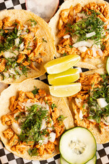Mexican tacos with condiments and vegetables