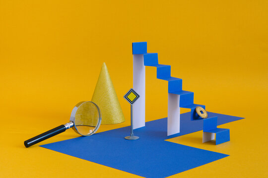 A minimalistic still life with a paper ladder