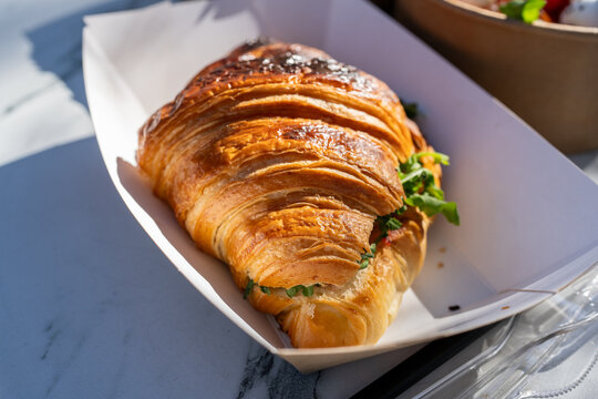 Delicious Croissant Sandwich In Eco-Friendly Packaging