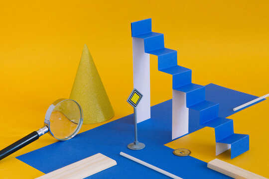 A minimalistic still life with a paper ladder