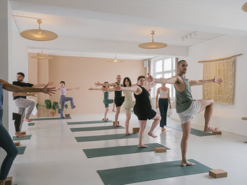 Group Yoga Class In Bright Spacious Yoga Studio