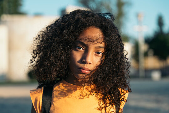 Confident little girl looking aside