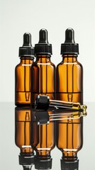 Amber glass dropper bottles with pipettes, reflective surface. Aromatherapy and skincare concept
