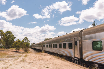 Fototapeta premium The iconic 'Southern Aurora' passenger train stopped at remote Ben Bullen Station