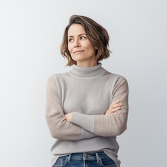 Obraz premium woman in her thirties, dressed casually in jeans and a sweater,