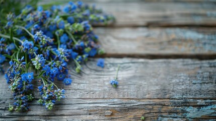 Obraz premium Blue wildflowers bouquet on weathered wood Rustic living Close up Focused Spacious area