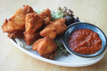 Crispy Fried Chicken Bites with Dipping Sauce, a delectable appetizer for food enthusiasts