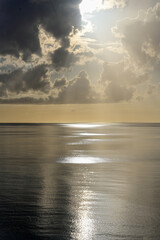 Bahamas sunset in gold tone