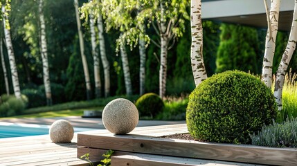 garden steps with round balls and boxwood hedges, swimming pool in the background