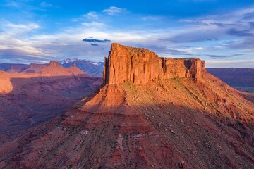 Butte and mesa rock formations in the desert at sunrise. Moab, Utah, United States of America.