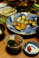 A lot of different dishes arrayed on the dinner table in japan.