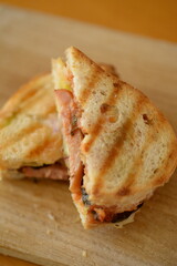 A ham panino sandwich for snack.